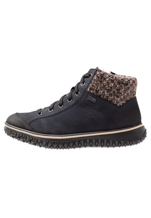 Black high-top shoe with a textured brown patterned collar, rubber sole, and metallic eyelets for laces, featuring a smooth leather exterior.