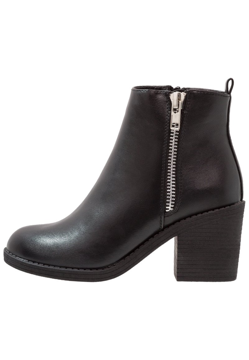 Black ankle boot made of sleek leather, featuring a side zipper, rounded toe, and a textured block heel for added stability.