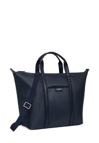Marineblauwe tote bag van gestructureerd synthetisch materiaal, met dubbele handvaten, een afneembare schouderband en een voorvak met logo-detail.