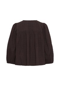 Blouse ample à manches longues, texturée et brun foncé, vue de dos avec un tissu froncé sous l’empiècement et un col rond.
