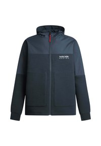 Jakna s kapuljačom u tamnoplavoj boji s dizajnom u blokovima boja. Ima prednji patentni zatvarač, dva velika džepa i Red Bull Racing logotip na prsima.