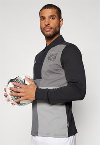 Umbro Polo - black/multi coloured