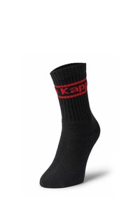 Svart knelange strømpe med ribbet tekstur, med en rød logo-band. Strømpen har forsterket tå og hæl for holdbarhet.