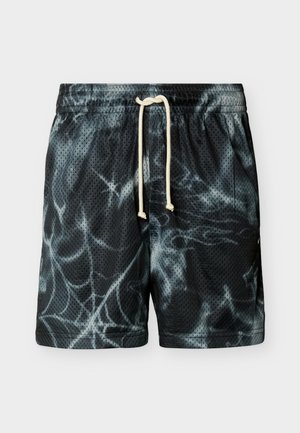 Μαύροι σορτς από δίχτυ με λευκό σχέδιο αραχνόδικτυου και λευκό κορδόνι στη ελαστική μέση, παρουσιασμένα σε απλό φόντο.