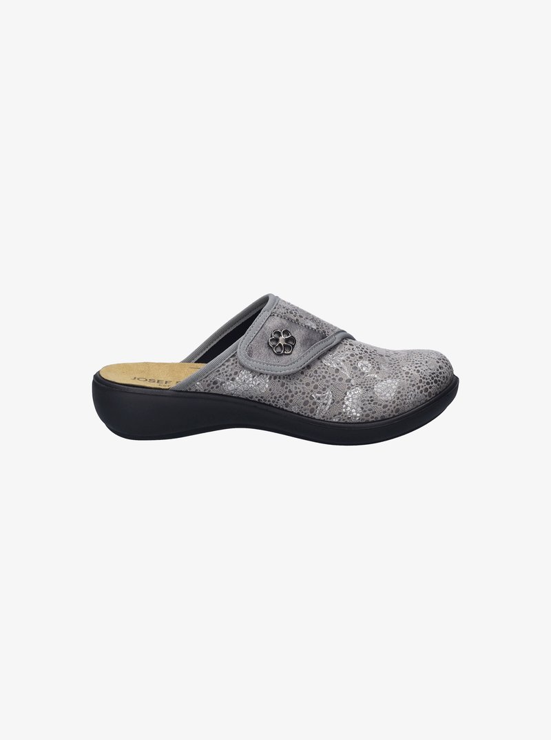Gray slip-on shoe with a textured upper featuring a floral pattern and a decorative button. Soft insole and black rubber outsole.