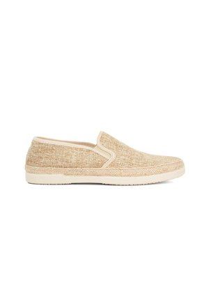 Beige slip-on shoe with textured fabric upper, braided midsole detail, and white rubber outsole, shown in profile on a white background.