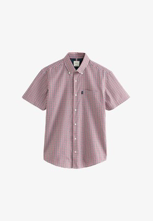 Camisa de manga corta, con botones, en un patrón a cuadros rojo y azul marino, con un bolsillo frontal y un cuello clásico. Material de algodón.