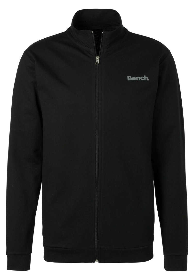 Zwarte zip-up jas van zacht materiaal, met een hoge kraag, geribbelde manchetten en een klein grijs logo op de linkerborst.