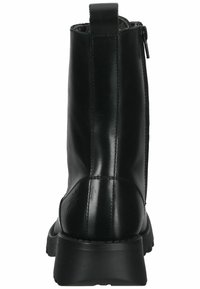 Black leather ankle boot with a smooth texture, structured shape, rounded toe, and a side zipper detail. Thick sole with slight heel elevation.