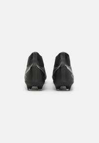Puma Scarpe da calcio per terreni duri - black