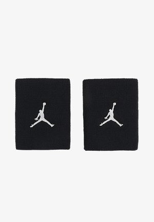 Black wristbands made of woven cotton, featuring a white Jordan logo prominently displayed on each. Simple rectangular design.