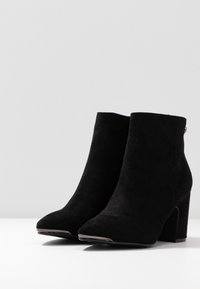 XTI Tronchetti - black