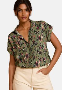 Unselected, khaki green animal print