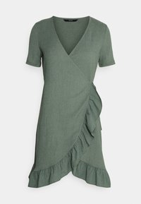 Vihreä kietaisumekko, joka on valmistettu tekstuuriominaisuudella varustetusta kankaasta. Mekossa on lyhyet hihat, röyhelöinen helma ja sivusolki, joka mahdollistaa säädettävän istuvuuden.