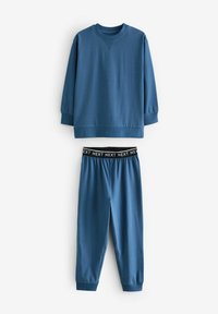 Sweat-shirt bleu à manches longues et col rond, associé à un pantalon ajusté assorti avec une taille élastique ornée du logo de la marque.
