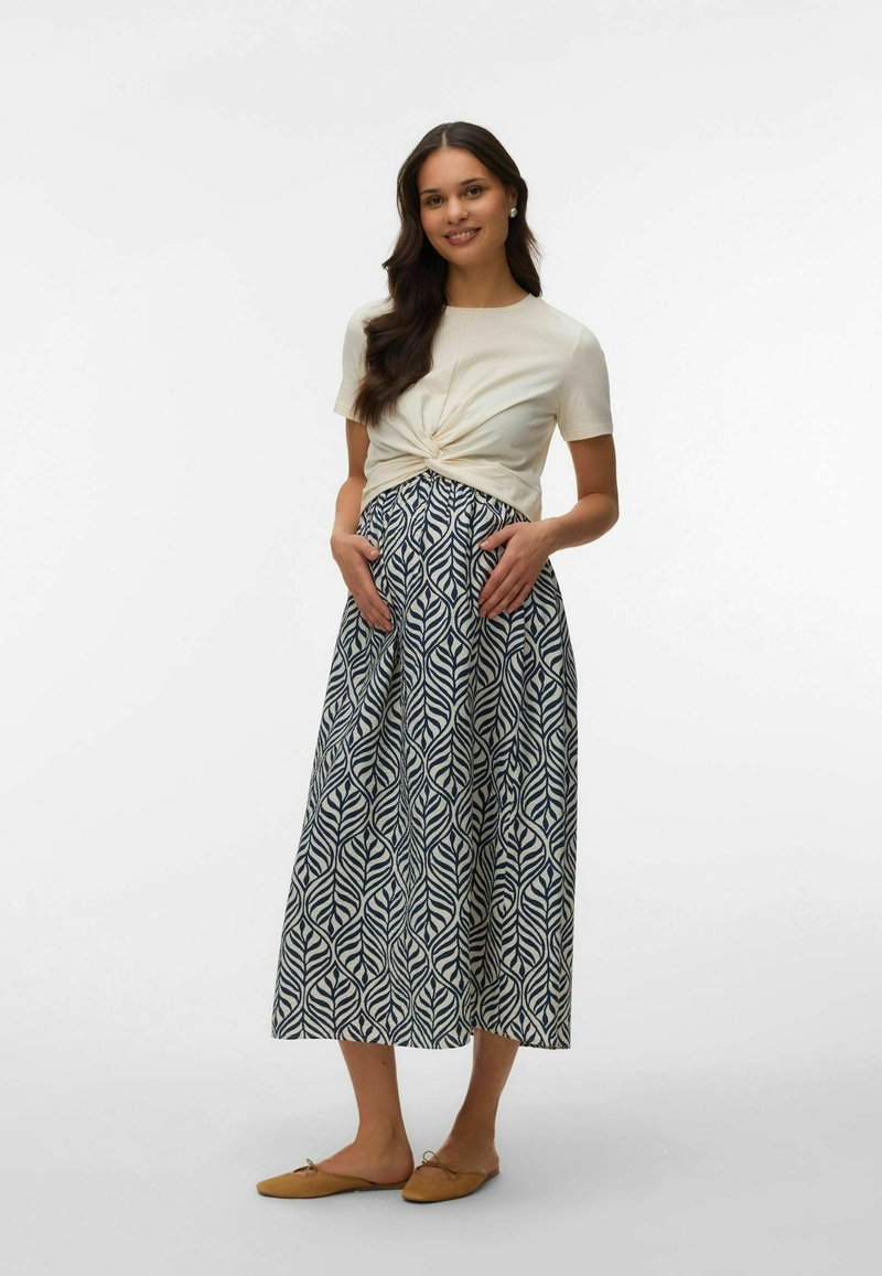 Chemise en voile de coton brodé en dentelle