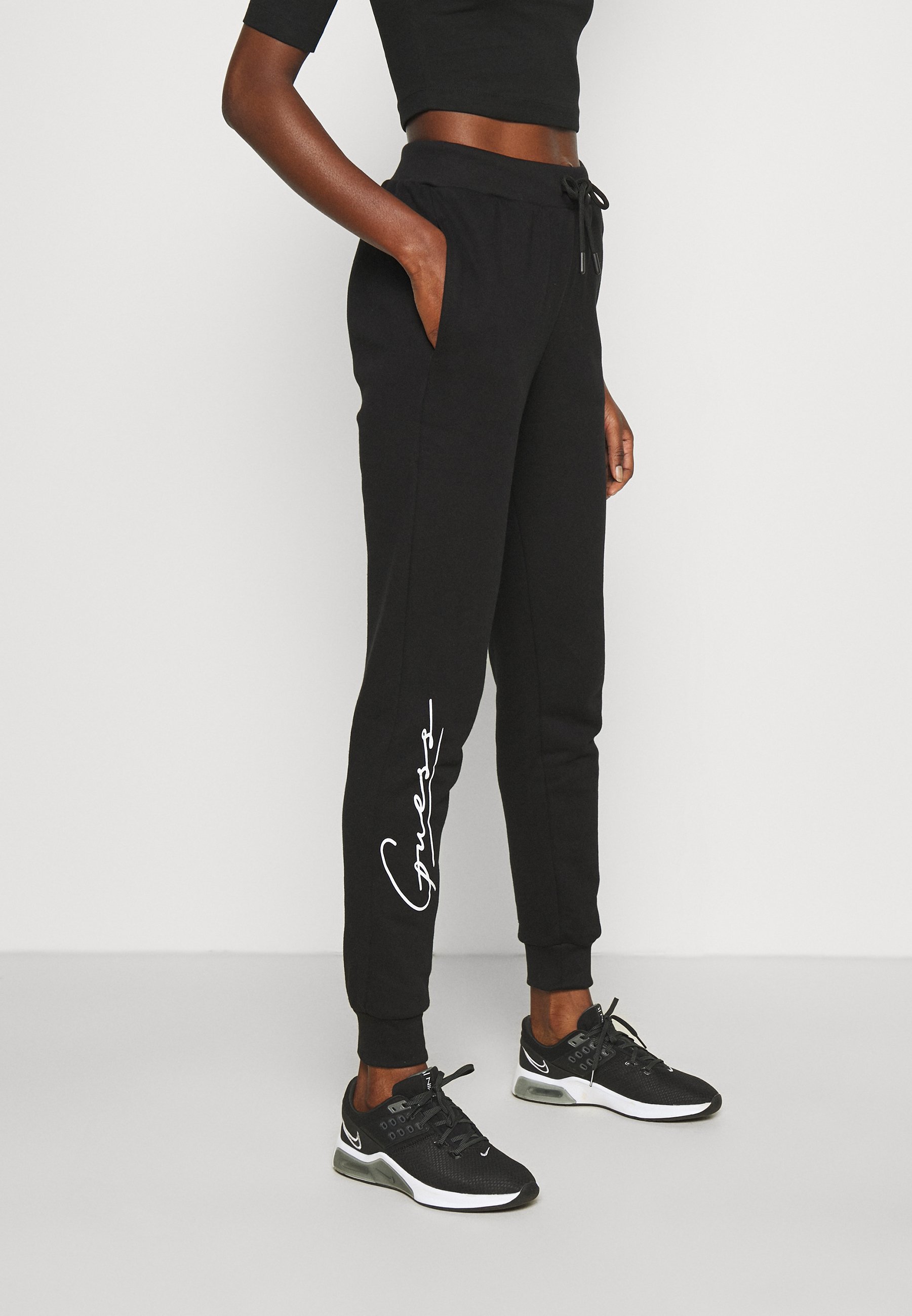 Guess ALEXANDRA - Tracksuit bottoms 