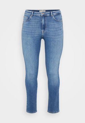 Jeans in denim azzurro chiaro con vestibilità slim, dotati di un classico design a cinque tasche e cuciture in vista. Nessun abbellimento o motivo.