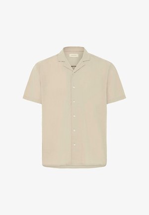 Bēša īsroku krekls ar pogām, nometamu apkakli un sešām baltām pogām, attēlots uz baltas fona.