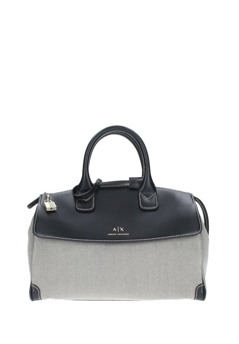 Borsa nera e crema con corpo texturizzato, dettagli in pelle liscia, doppi manici e chiusura con zip. Presenta dettagli del logo e cuciture.