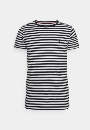 T-shirt à manches courtes rayé horizontal noir et blanc avec un petit logo sur la poitrine gauche et un col rond.