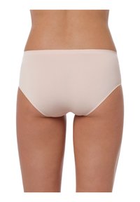 Culotte hipster beige con una texture morbida, design senza cuciture e una cintura elastica. Presenta un taglio a vita bassa per comfort e vestibilità.