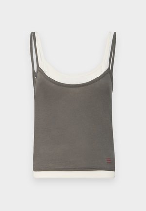 Grå tanktop med doble spaghetti stropper, cremefarvet kant og ensartet design. Har en lille rød accentering nederst.