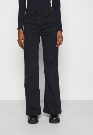 Flared Jeans - rinsed denim