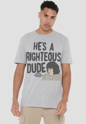 Gray cotton t-shirt featuring bold black text "HE'S A RIGHTEOUS DUDE" and an illustration of a character from "Ferris Bueller's Day Off."