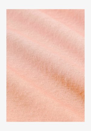 Tessuto morbido e texturizzato di un rosa chiaro con sottili variazioni di tono, che mostra un motivo a maglia sottile e una caduta delicata.