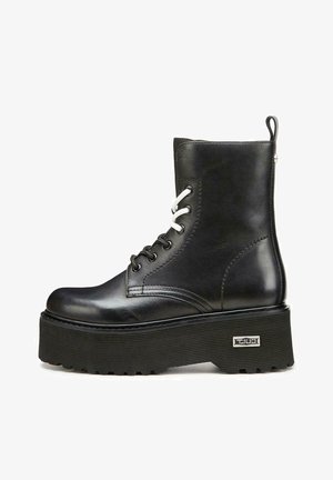 Cult, Bottines à plateau - black