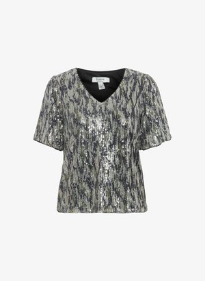 Lühikeste varrukatega V-kaelusega särk, millel on hõbedane ja musta litrite muster. Omab pehmet musta voodrit ja kerget tekstuuri litrite tõttu.