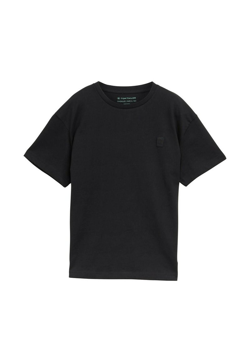 T-shirt nera oversize realizzata in cotone, con maniche corte, scollo rotondo e un piccolo dettaglio con logo sul davanti.