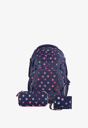 Navy blue backpack, pencil case, and wallet with pink, purple, and gray polka dots and front buckle straps.