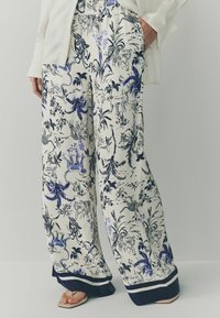 Next Kalhoty - white blue animal print