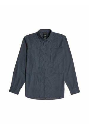 Chemise à manches longues gris foncé avec un devant boutonné, deux grandes poches sur la poitrine et un col. Tissu doux avec une coupe décontractée.