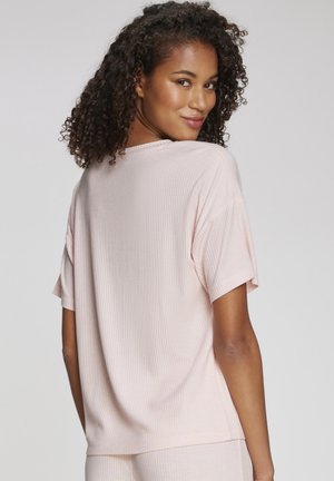 Light pink, ribbed fabric t-shirt with a loose fit, short sleeves, and a round neckline, viewed from the back.