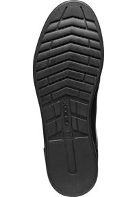 Suola di scarpa in gomma nera con un motivo a zigzag, fori di drenaggio e dettagli del logo, progettata per aderenza e traspirabilità.