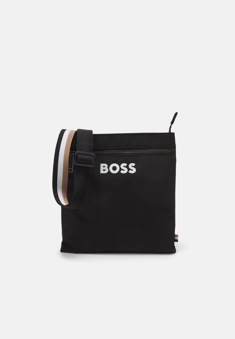 Black fabric bag with adjustable shoulder strap. Features a top zipper and white "BOSS" logo. Includes a striped accent in beige and white.