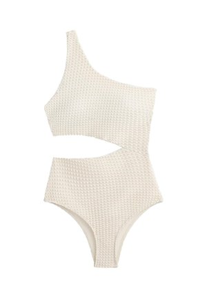 Maillot de bain blanc texturé à une épaule avec une découpe frontale à la taille et des ouvertures de jambe hautes.