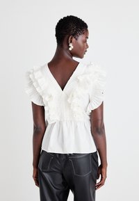 YAS YASRUNA RUFFLE - Bluse - star white/hvid - Zalando.dk