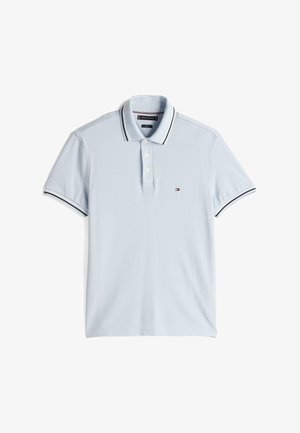 Light blue short-sleeve polo shirt with black and white striped collar and sleeve edges, three buttons, and small logo on the chest.