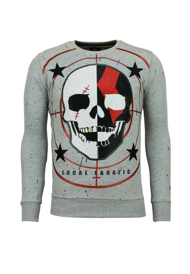 Grijze sweatshirt met een grote zwart-wit-rode schedelafbeelding, sterren en de tekst "LOCAL FANATIC." Gemaakt van katoen met een zachte textuur.
