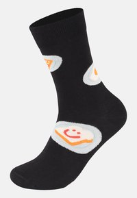 Zwarte sokken met kleurrijke voedselthema patronen, waaronder toast met een lachend gezicht, op een zachte, gebreide stof.