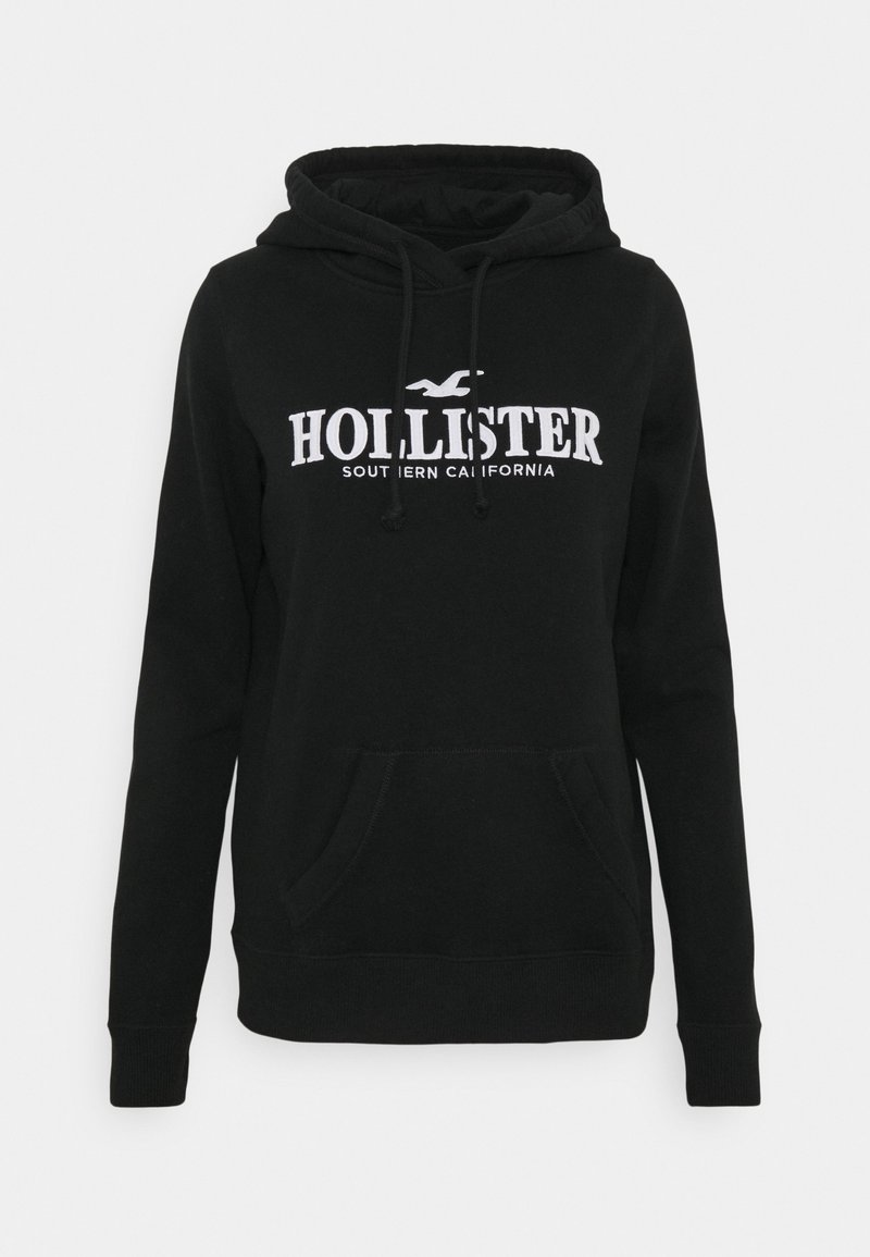 Svart hoodie i bomullsblandning med känguruficka, dragsko i huvan och vitt tryckt märke med texten "Hollister Southern California."