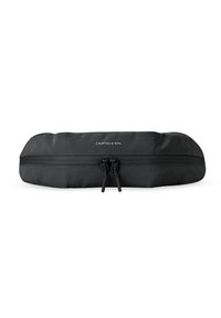 Trousse rectangulaire noire zippée avec deux curseurs et logo "Kapten & Son" sur une surface en tissu texturé.