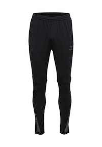 Schwarze Sporthosen aus Stretchmaterial mit einem elastischen Bund, taillierter Passform und reflektierenden Akzenten an den Seiten.