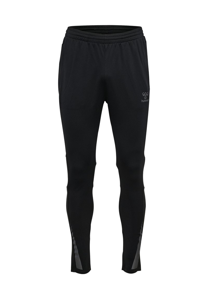 Schwarze Sporthosen aus Stretchmaterial mit einem elastischen Bund, taillierter Passform und reflektierenden Akzenten an den Seiten.