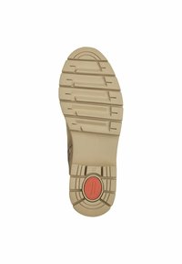 Semelle de chaussure beige avec un motif de texturation et un accent circulaire rouge. Comprend un indicateur de taille 37 en relief. Matériau durable apparent.