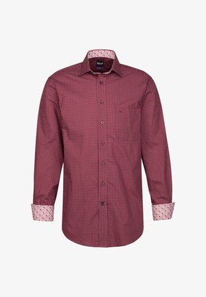 Camicia rossa a maniche lunghe con un piccolo motivo a pois bianchi, polsini interni a fiori a contrasto e taschino sul petto. Realizzata in tessuto leggero.